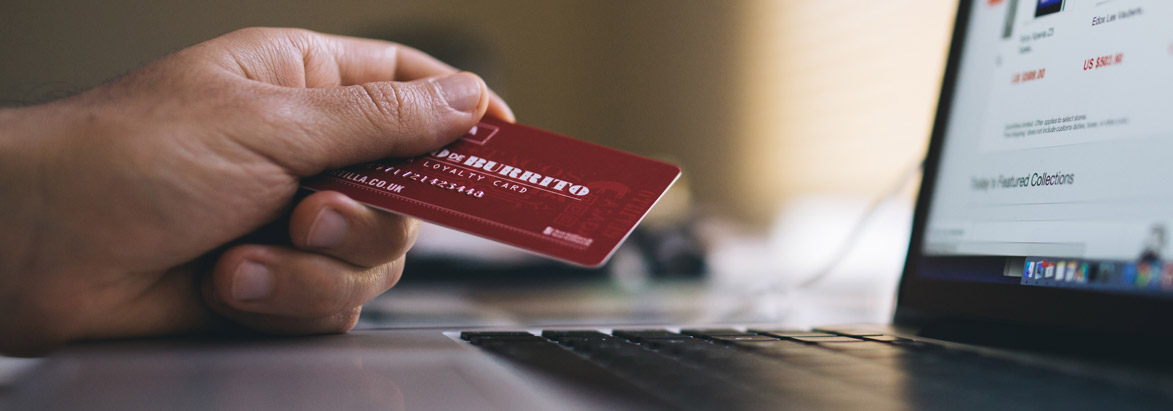 Man with credit card in his hand