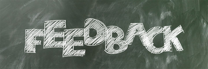 Image of a chalkboard that says feedback.